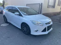 Gebraucht Ford Focus Titanium 140 PS (102 kW) 2013 Frostweiß Kombi