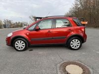 Gebraucht Suzuki SX4 Club 135 PS (99 kW) 2011 Orange SUV