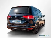Używany VW Touran Active 150 KM (110 kW) 2023 Czarny Minivan