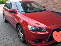 Gebraucht Mitsubishi Lancer 109 PS (80 kW) 2010 Rot Limousine