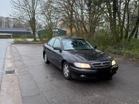 Second-hand Opel Omega 144 CP (105 kW) 2003 Negru Berlinǎ