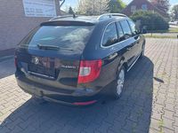 Second-hand Skoda Superb 140 CP (102 kW) 2012 Negru Break