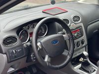 Second-hand Ford Focus 110 CP (80 kW) 2010 Albastru Coupe