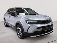 Gebraucht Opel Mokka-e Elegance 100 kW (136 PS) 2023 Quarz silber metallic SUV