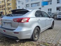 Second-hand Mitsubishi Lancer 117 CP (86 kW) 2010 Argintiu Berlinǎ