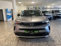 Gebraucht Opel Mokka Elegance 131 PS (96 kW) 2022 Kontrast grau/quarz silber (metallic) SUV