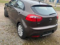 Gebraucht Kia Rio 109 PS (80 kW) 2012 Braun Kleinwagen