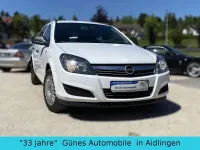 Używany Opel Astra Selection 116 KM (85 kW) 2010 Biały Sedan/Limuzyna