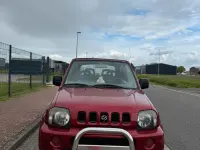 Second-hand Suzuki Jimny 86 CP (63 kW) 2000 Roșu SUV