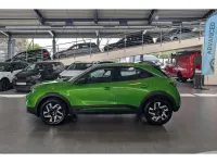 Gebraucht Opel Mokka-e Elegance 100 kW (136 PS) 2024 Matcha grün (metallic) SUV