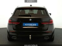 Gebraucht BMW 520 190 PS (139 kW) 2023 Schwarz Kombi