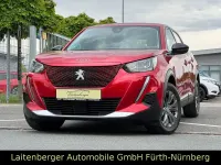 Gebraucht Peugeot e-2008 Active 100 kW (136 PS) 2022 Rot SUV