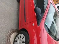 Second-hand Renault Twingo 60 CP (44 kW) 2009 Roșu Hatchback