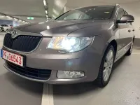 Używany Skoda Superb Elegance 140 KM (102 kW) 2012 Purpurowy Kombi