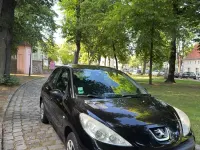 Gebraucht Peugeot 206+ 73 PS (53 kW) 2011 Schwarz Kleinwagen