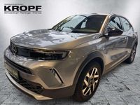 Gebraucht Opel Mokka-e Elegance 100 kW (136 PS) 2022 Kontrast grau/quarz silber SUV