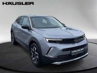 Gebraucht Opel Mokka-e Elegance 100 kW (136 PS) 2022 Quarz silber (metallic) SUV