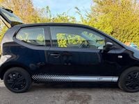 Usado VW up! 59 CV (43 kW) 2012 Negro Utilitario