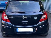 Second-hand Opel Corsa Active 100 CP (73 kW) 2014 Negru Hatchback