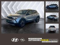 Gebraucht Opel Mokka Elegance 101 PS (74 kW) 2023 Kontrast grau/quarz silber SUV