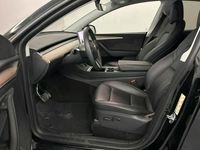 Gebraucht Tesla Model Y 378 kW (514 PS) 2023 Sonderlackierung schwarz SUV