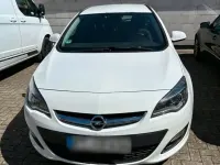 Używany Opel Astra 136 KM (100 kW) 2014 Biały Kombi