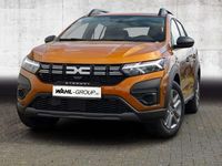 Gebraucht Dacia Sandero Essentiel 91 PS (66 kW) 2023 Taklamakanorange metallic (or Kleinwagen