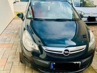 Second-hand Opel Corsa Active 68 CP (50 kW) 2013 Verde Hatchback