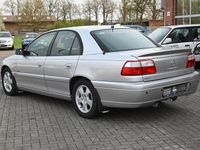 Second-hand Opel Omega Edition 144 CP (105 kW) 2000 Argintiu Berlinǎ