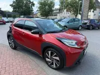 Gebraucht Toyota Aygo X X-plore 72 PS (52 kW) 2023 Chili red/ black mica SUV