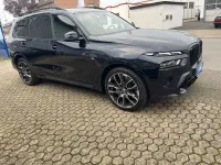Gebraucht BMW X7 M Sport 352 PS (258 kW) 2024 Carbonschwarz metallic SUV