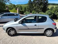 Używany Peugeot 206 60 KM (44 kW) 2002 Szary Sedan/Limuzyna