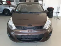 Używany Kia Rio Attract 86 KM (63 kW) 2012 Brązowy Sedan/Limuzyna