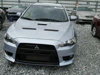 Second-hand Mitsubishi Lancer 401 CP (294 kW) 2013 Argintiu Coupe