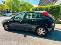 Używany Ford Focus 75 KM (55 kW) 2003 Czarny Sedan/Limuzyna