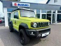 Gebraucht Suzuki Jimny Comfort 102 PS (75 kW) 2021 Kinetic yellow / black SUV