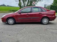 Gebraucht Ford Focus Ghia 116 PS (85 kW) 1999 Rot Limousine