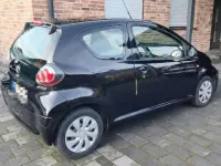 Gebraucht Toyota Aygo Cool 68 PS (50 kW) 2012 Schwarz Kleinwagen