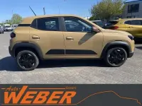Gebraucht Dacia Spring Extreme 47 kW (65 PS) 2025 Beige Kleinwagen