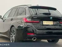 Gebraucht BMW 320e 204 PS (150 kW) 2022 Schwarz uni Kombi