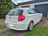 Używany BMW 116 122 KM (89 kW) 2009 Biały Hatchback