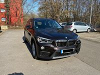 Używany BMW X1 Advantage 150 KM (110 kW) 2016 Brązowy SUV