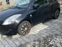 Gebraucht Suzuki Swift 80 PS (58 kW) 2012 Schwarz Kleinwagen