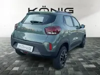 Gebraucht Dacia Spring Extreme 47 kW (65 PS) 2023 Grün "flechtengrau" Kleinwagen