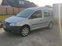 Second-hand VW Caddy 109 CP (80 kW) 2009 Argintiu Monovolum