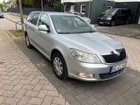 Second-hand Skoda Octavia Ambiente 105 CP (77 kW) 2010 Argintiu Break