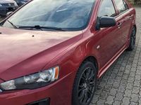 Gebraucht Mitsubishi Lancer 109 PS (80 kW) 2010 Rot Limousine