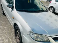Occasion Mazda 323 77 ch (56 kW) 2001 Gris Break