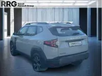Gebraucht Dacia Duster 131 PS (96 kW) 2025 Beige (sandsteinbeige) SUV