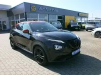 Gebraucht Nissan Juke Tekna 114 PS (83 kW) 2021 Black / sunset red (metallic) SUV